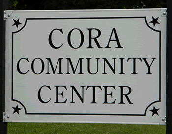 Cora Community Center sign